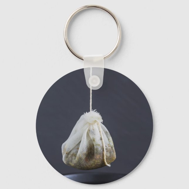 Tea bag is hung in a cup keychain (Front)