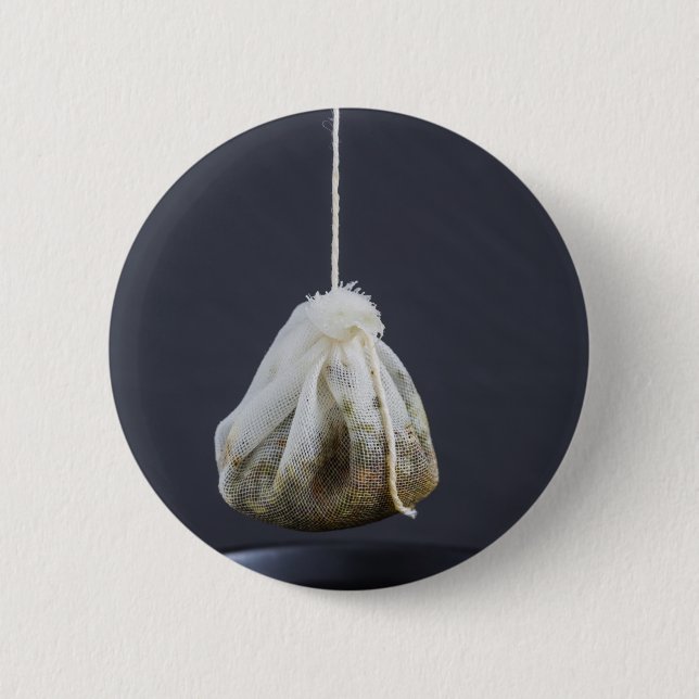Tea bag is hung in a cup pinback button (Front)