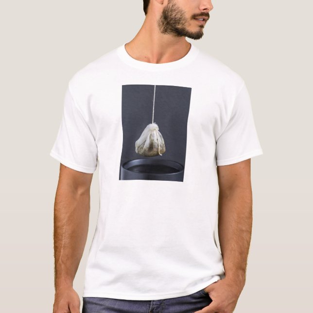 Tea bag is hung in a cup T-Shirt (Front)