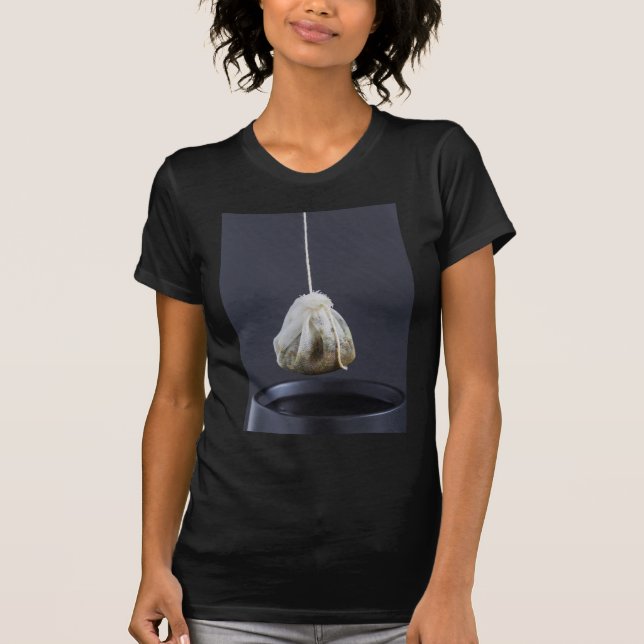 Tea bag is hung in a cup T-Shirt (Front)