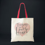 Teacher gift tote bag<br><div class="desc">Teaching its a work of heart personalised teacher gift tote bag. With hand lettered script, a pink watercolor heart and space for their name. The perfect end of year or holiday gift for your favourite teacher.</div>