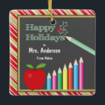 Teacher Happy Holidays Chalkboard Apple Ceramic Ornament<br><div class="desc">This Christmas tree ornament features a chalkboard,  a red apple and color pencils. The text on the chalkboard reads: Happy Holidays. Customizable text allows you to add the teacher's name and your own name. The makes an awesome Christmas keepsake gift for a special teacher.</div>