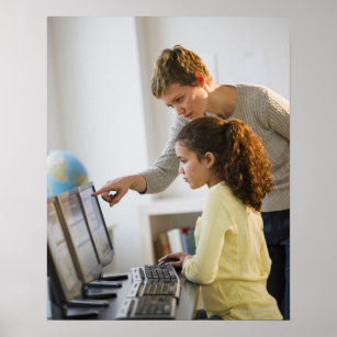 Teacher helping student in computer lab poster
