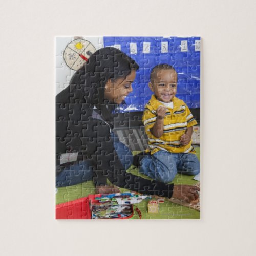 Teacher with toddler in daycare jigsaw puzzle