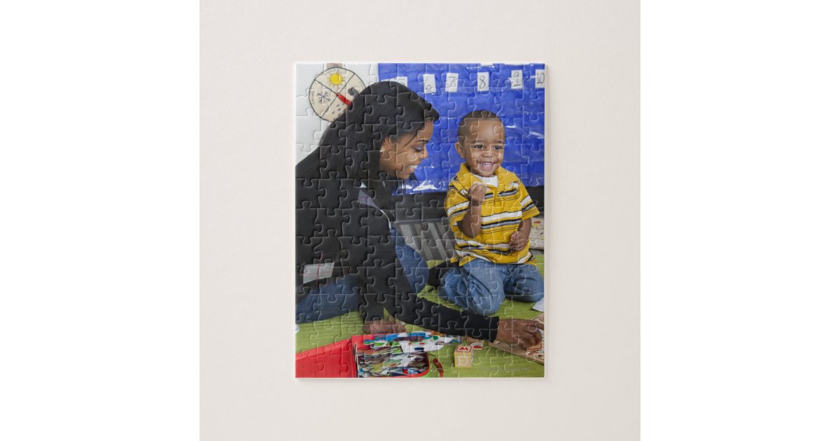 Teacher with toddler in daycare jigsaw puzzle | Zazzle.com