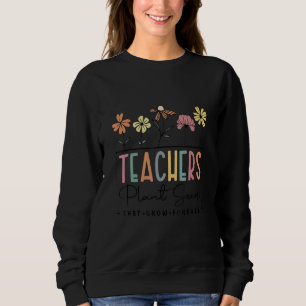 Teachers Plant Seeds That Grow Forever Book Sweatshirt