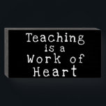 "Teaching is a Work of Heart" Love Wood Box Sign<br><div class="desc">Simple Minimalist Rustic Wood Sign - Wall Plaque or Shelf Sitter Signage for Your Home, Office Cubicle or Shop Decor. "Teaching is a Work of Heart" Teacher Love Chalkboard Style Black Wood Box Sign White Text At VanOmmeren we live our dream and create amazing designs for you, your home and...</div>