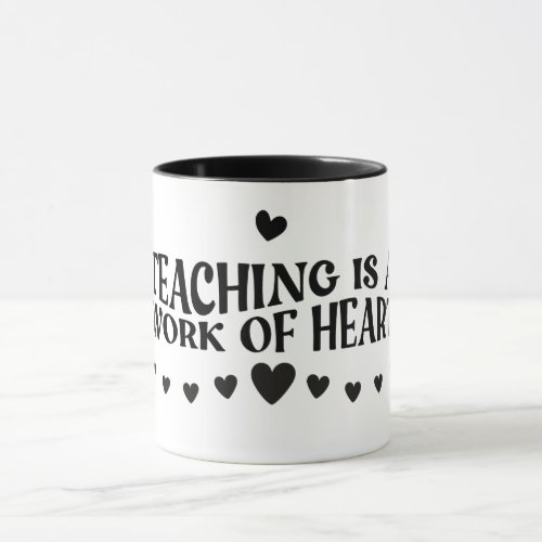 Teaching is a work of heart mug