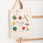 Teaching is a Work of Heart Tote Bag<br><div class="desc">Introducing our enchanting tote bag designed exclusively for teachers who inspire and nurture young minds. This tote bag combines practicality, personalization, and a touch of whimsy, making it a perfect accessory for educators with a passion for teaching. The centerpiece of this tote bag design is a beautifully crafted quote, delicately...</div>