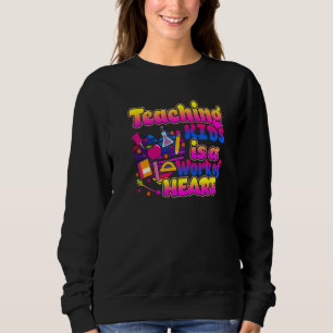 Teaching Kids Is A Work Of Heart Cute Teacher   Sweatshirt