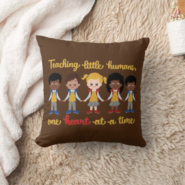 TEACHING LITTLE HUMANS ONE HEART AT A TIME         THROW PILLOW (Blanket)