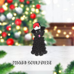 Teacup Poodle Christmas Pet Ornament<br><div class="desc">Cute,  curly haired,  black,  teacup poodle with red Santa Claus hat on top of head.  Adorable eyes and pink tongue out.  



Graphic illustration by: Lori@SaltTownStudio</div>