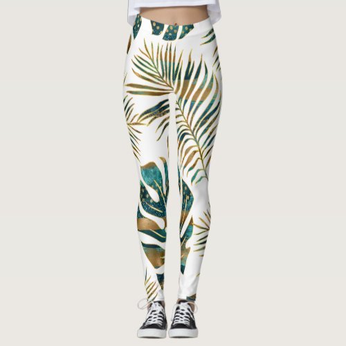 Teal and gold patterned tropical leaves leggings