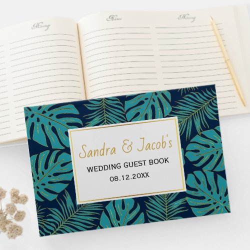 Teal and navy blue tropical leaves wedding guest book