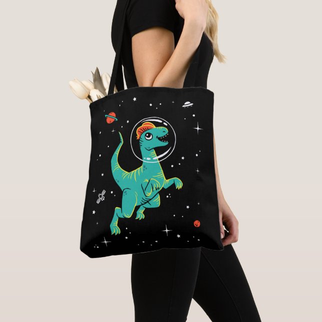 Teal And Orange Dilophosaurus Dinos In Space Tote Bag (Close Up)