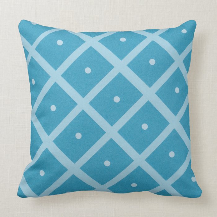 Teal and turquoise pillow with dots