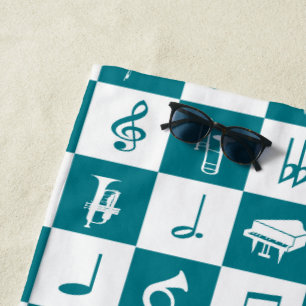 Teal and white music notes and instruments beach towel