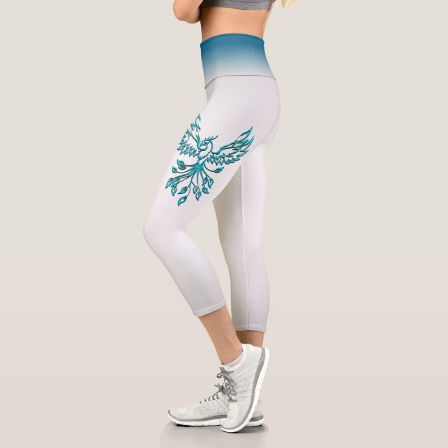 Teal Blue Phoenix Rises on Silver Capri Leggings (Left)