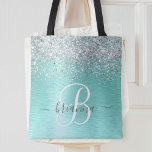 Teal Brushed Metal Silver Glitter Monogram Name Tote Bag<br><div class="desc">Easily personalize this trendy chic tote bag design featuring pretty silver sparkling glitter on a teal brushed metallic background.</div>