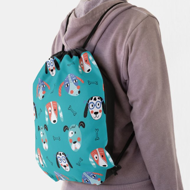 Teal Cartoon Dog Faces Pattern Drawstring Bag (Insitu)