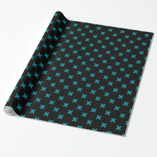 Teal cross stitches on black wrapping paper