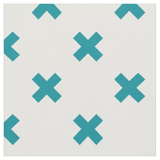 Teal cross stitches on white fabric