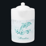 Teal Dolphin Personalized Teapot<br><div class="desc">Enjoy your tea with a Teal Dolphin Personalized Teapot.  Teapot design features a vibrant metallic dolphin against a muted seascape adorned elegant scrolls with an area to personalize with your name.  Additional gift items available with this design as well as a variety of colors.</div>