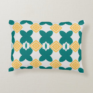  teal-green, butterfly-like shape & yellow diamond accent pillow