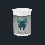 Teal Jeweled Butterfly Beverage Pitcher<br><div class="desc">Serve your hot or cold beverages with this unique Teal Jeweled Butterfly Personalized Porcelain Pitcher. Pitcher design features a vibrant jeweled butterfly against an elegant vintage gray damask pattern. Additional gift items available with this design as well as a variety of colors.</div>