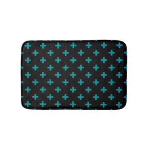 Teal polka crosses on black bath mat
