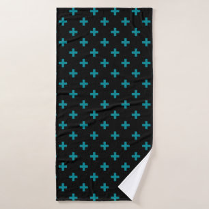 Teal polka crosses on black bath towel