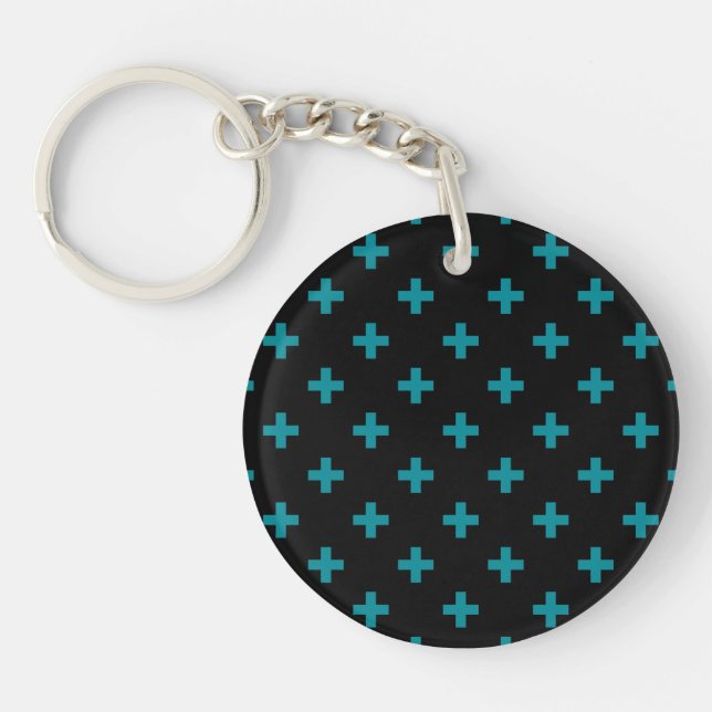 Teal polka crosses on black keychain (Front)