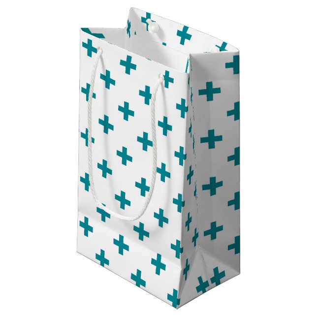 Teal polka crosses on white small gift bag (Front Angled)