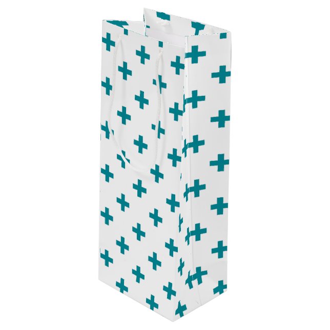 Teal polka crosses on white wine gift bag (Front Angled)