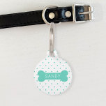 Teal Polka Dots And Dog Bone & Custom Pet Info Pet ID Tag<br><div class="desc">Turquoise / teal color small polka dots pattern together with a teal dog bone silhouette on the front. On the bone there is a personalizable text are for the name of the pet. The back has a personalizable text area for a phone number.</div>