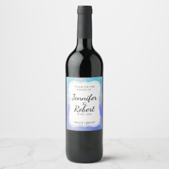 Teal Snowflake Bracket Winter Wedding Wine Label by NoteableExpressions at Zazzle