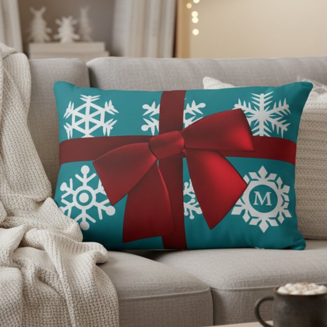 Teal Snowflake Monogram Red Bow Christmas Pillow (This personalized pillow adds a touch of elegant charm and warmth to any space.)