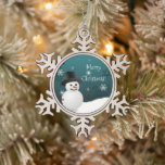 Teal Snowman Winter Scene Snowflake Ornament<br><div class="desc">Add a whimsical touch to your Christmas tree this holiday season with a Teal Snowman Winter Scene Snowflake Ornament. Ornament design features a happy snowman in a snowy wintry scene against a teal background adorned with matching color snowflakes. Additional gift and holiday items available with this design as well.</div>