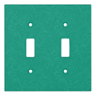 Teal textured surface with subtle swirling pattern light switch cover