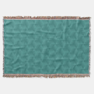 Teal throw blanket with a subtle 3D cube pattern 