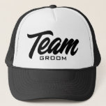 Team Groom script typography wedding party Trucker Hat<br><div class="desc">Team Groom script typography wedding party Trucker Hat. Custom black and white baseball cap for groom and groomsmen. Stylish hand lettering design for bachelor party games and more. Available in other cool colors too. Create them for your group of friends, guests, squad, crew, best man etc. Also available for bridal...</div>