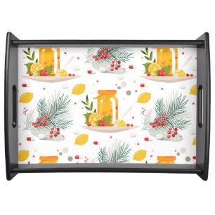 Teapot, lemon, cup of tea and flower serving tray