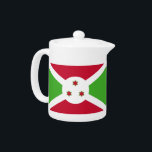 Teapot with flag of Burundi<br><div class="desc">Add a touch of Burundian pride to your tea time with our exclusive teapot featuring the flag of Burundi! Crafted with meticulous attention to detail, this teapot is more than just a functional kitchen item; it’s a celebration of Burundi’s heritage and cultural pride. The vibrant design prominently displays the iconic...</div>