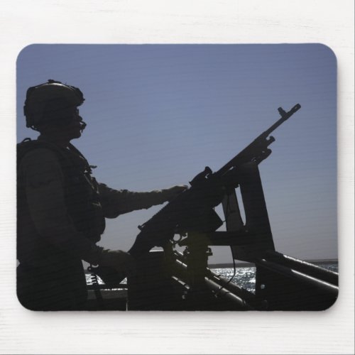Technician manning an M240 machine gun in Iraq Mouse Pad