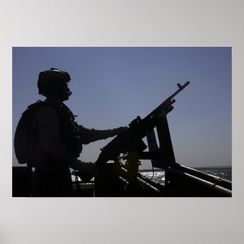 Technician manning an M240 machine gun in Iraq Poster