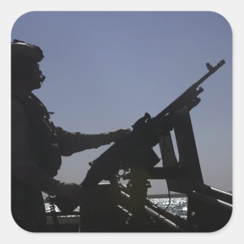 Technician manning an M240 machine gun in Iraq Square Sticker