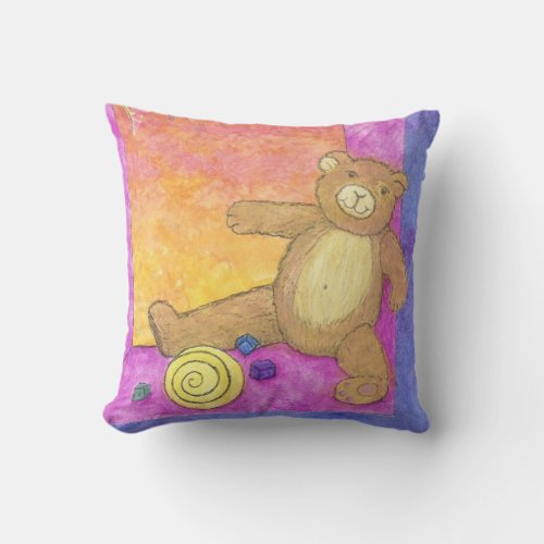 teddy bear on purple pillow