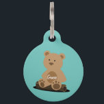 Teddy Bear Personalized White Text Pet ID Tag<br><div class="desc">A cute Teddy Bear sitting on a log,  has your pet's name on its belly. On the back,  personalize with your contact details. Add your pet's name and your contact information by following the "Personalize this template" link.</div>