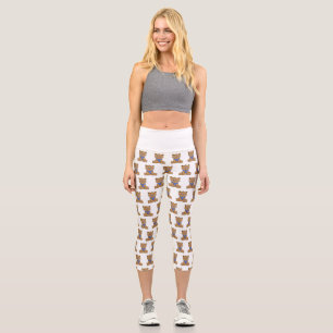 Teddy bear wearing a blue scarf capri leggings