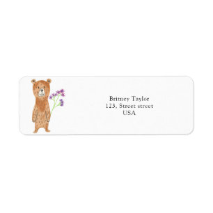 Teddy bear with flower label
